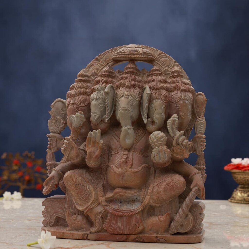 Side view of Pink Stone Panchmukhi Ganesh Idol carved from natural stone