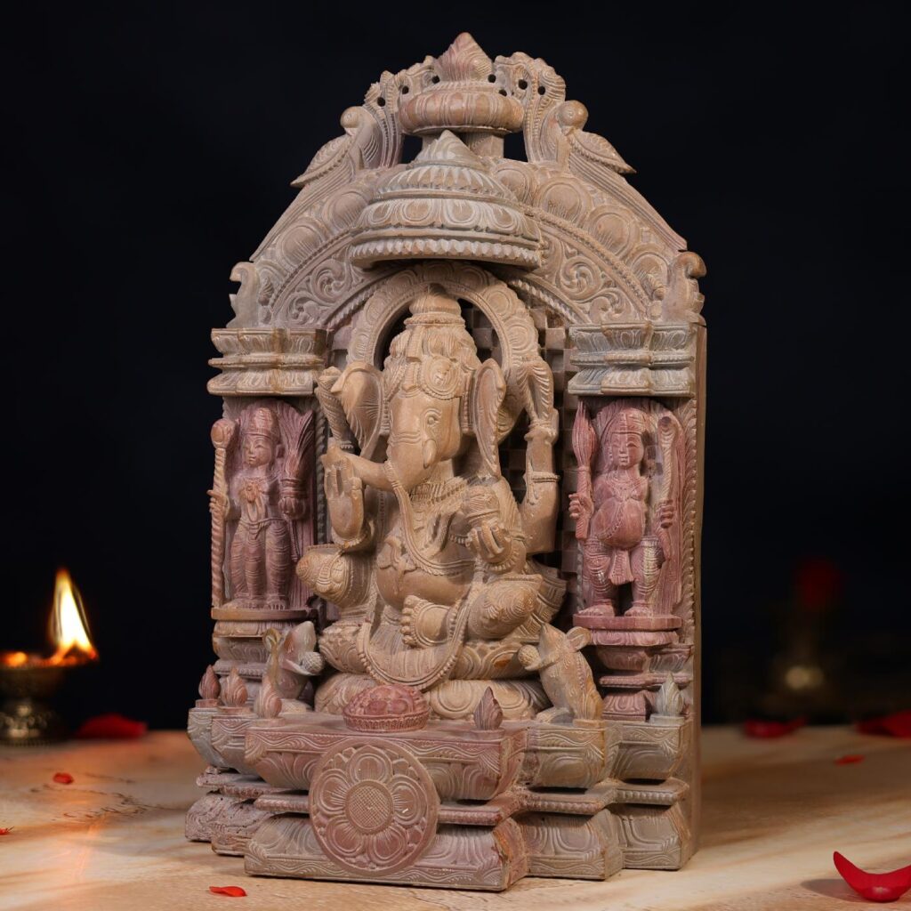 Handcrafted Ganesh murti on throne, detailed carving of Nandi and Bhringi