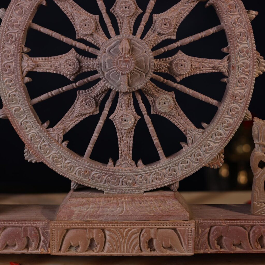 sun-temple-konark-chakra-pink-stone-close.jpg