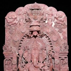 Close up detailing of pink stone Ganesh statue face