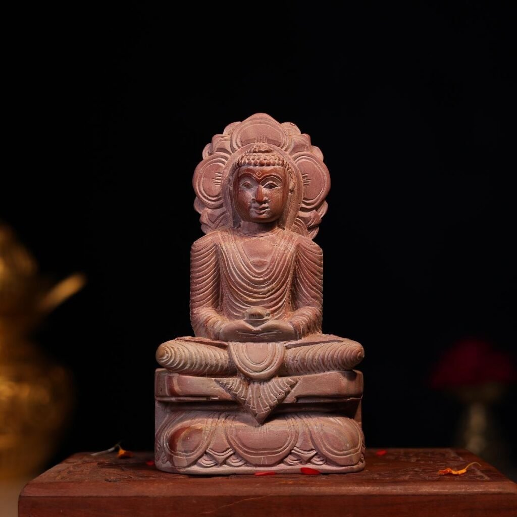 small stone buddha statue