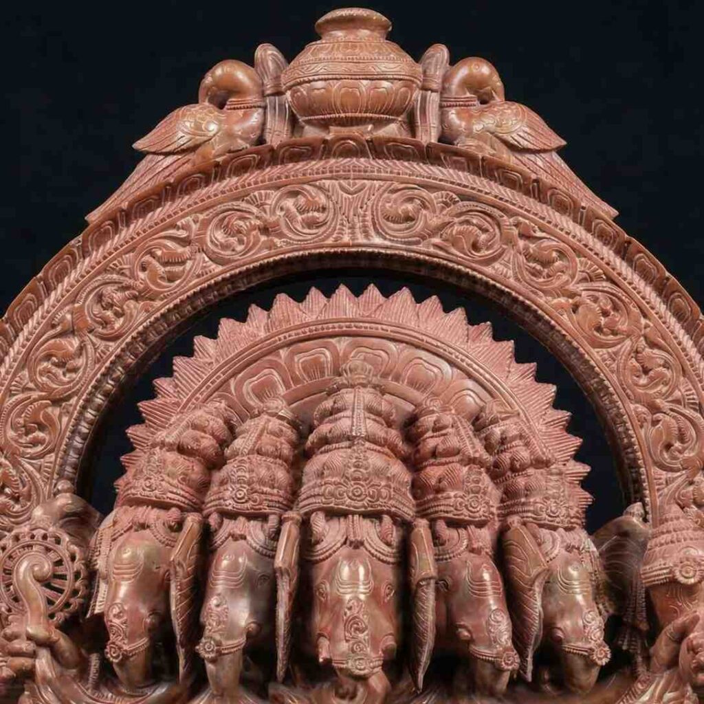 close up detail pink stone panchmukhi ganesh statue carving