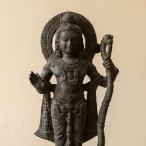 Intricate detailing highlights the Black Stone Ram Lalla Statue, showcasing Lord Ram's graceful stance and serene expression.