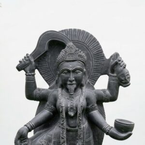 The idol features intricate details on the face and holds a bowl, 2.5 Feet Black Stone Kali Mata Idol for Temple.